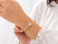 Anti tarnish single stone wavy bracelet