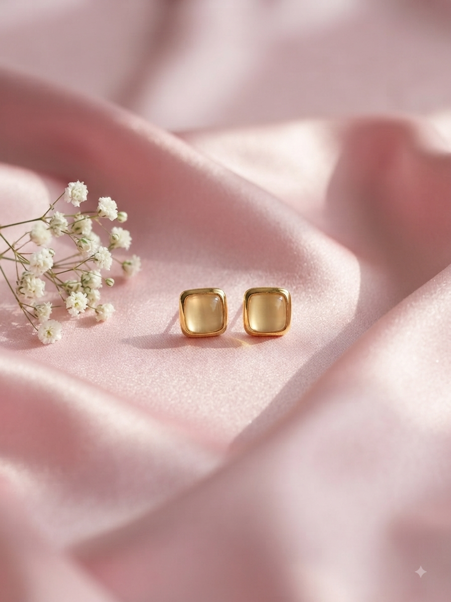 Anti tarnish off white golden studd earrings
